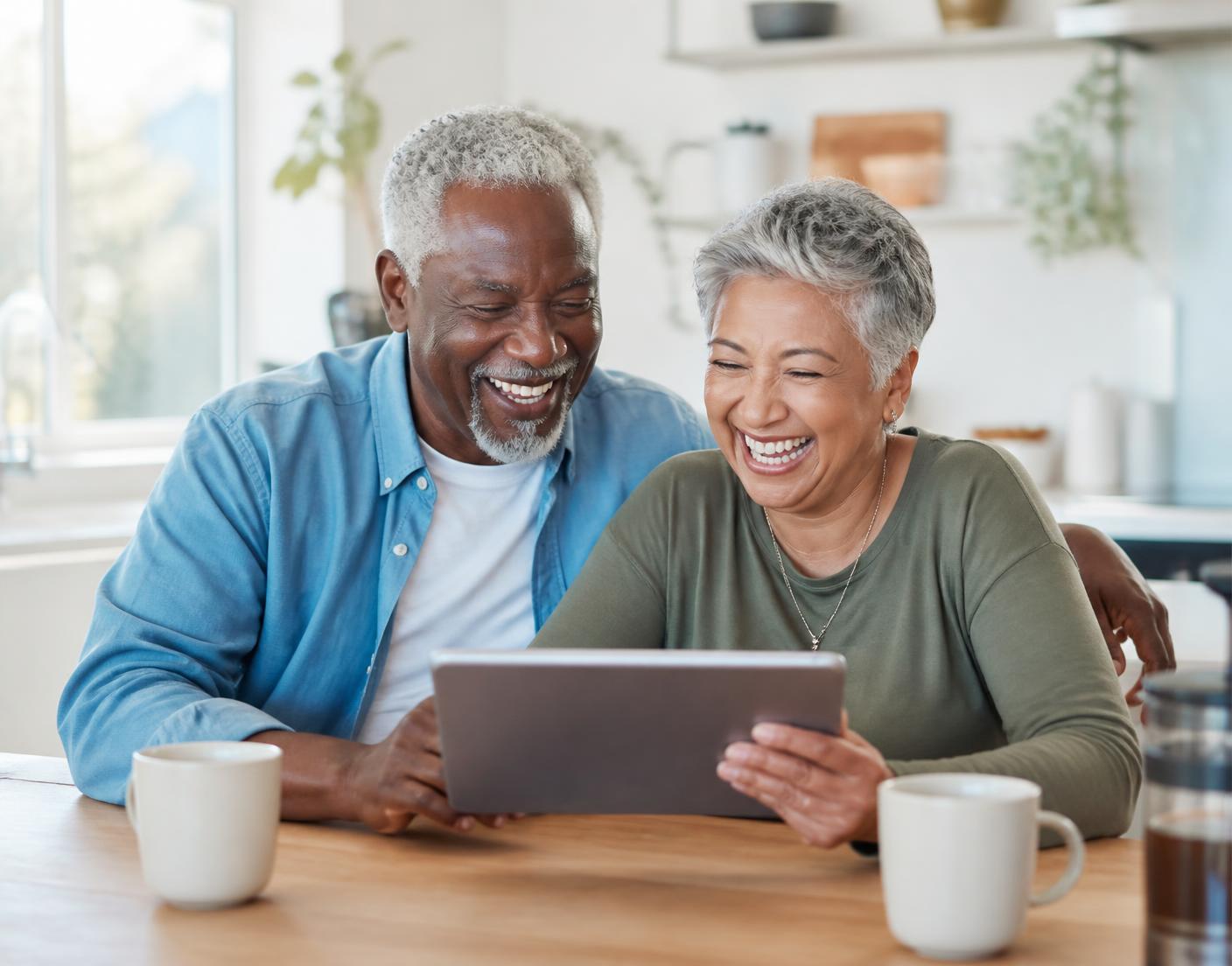 Retired Houston couple comparing Medicare plan options at their kitchen table